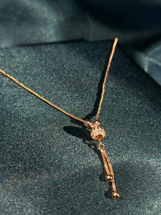 Golden Sphere Tassel Pendant